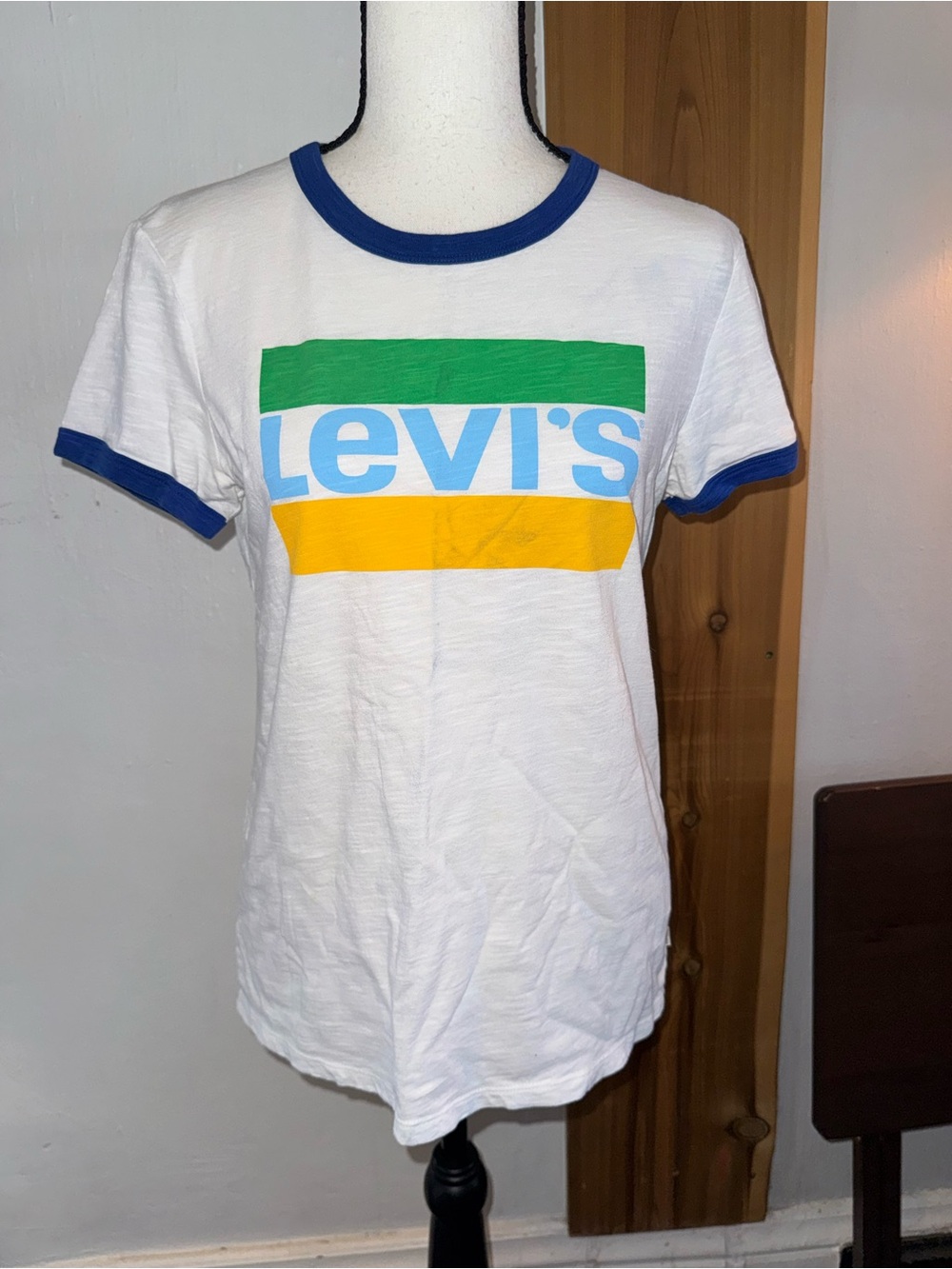 Levi's White Tee with Blue Trim and Green-Yellow Logo
